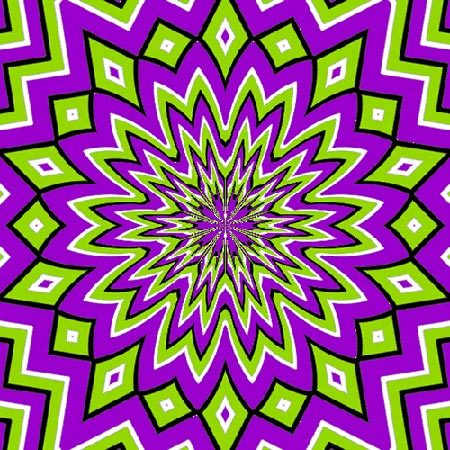 a gaudy symmetrical design of green, purple, black, and white appears to be breathing or pulsating, though it is in fact still