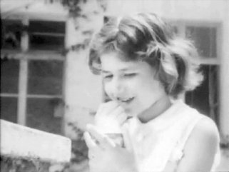 A Scene from “The Tsippori Affair”: The primary school is closed. A young girl puts on lipstick.